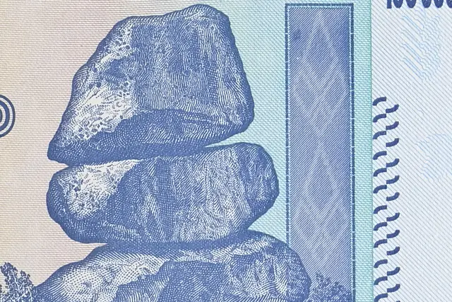 Enlarged detail of the Chiremba Balancing Rocks on a genuine Zimbabwe 100 trillion dollar note, the shading built from fine lines